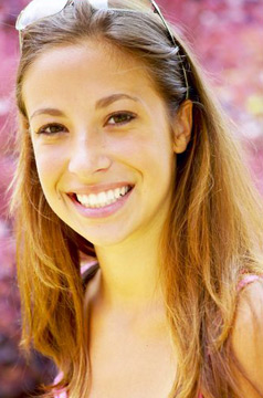 stockphoto smiling brunette woman with sunglasses